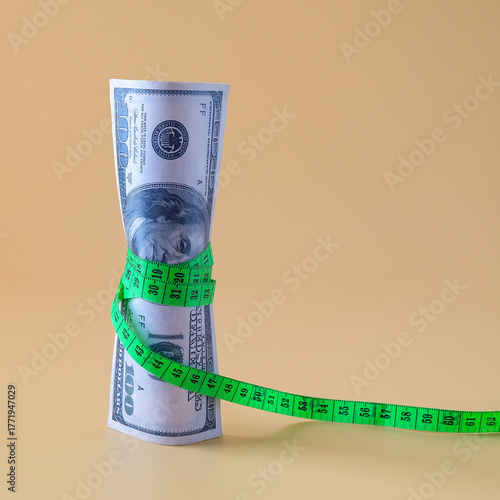 A Measuring tape for tying banknotes , Inflation rates. Price growth  concept.