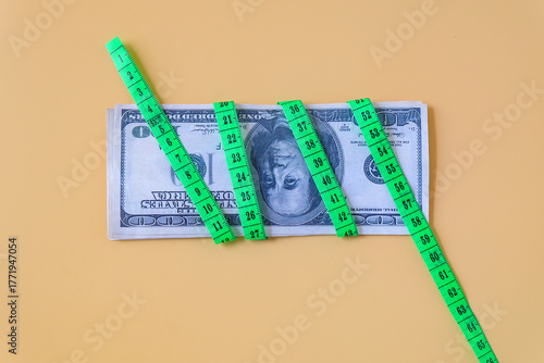 A Measuring tape for tying banknotes , Inflation rates. Price growth  concept.