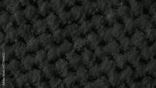 black braided material with an interesting pattern