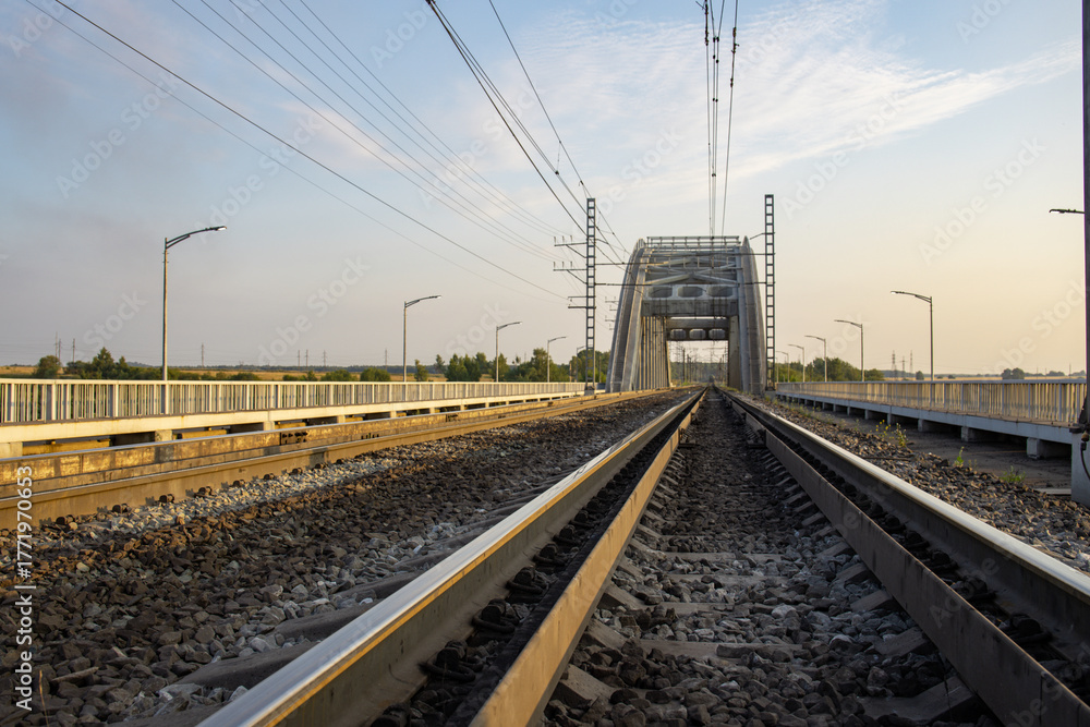 Fototapeta premium Train track with a bridge over it