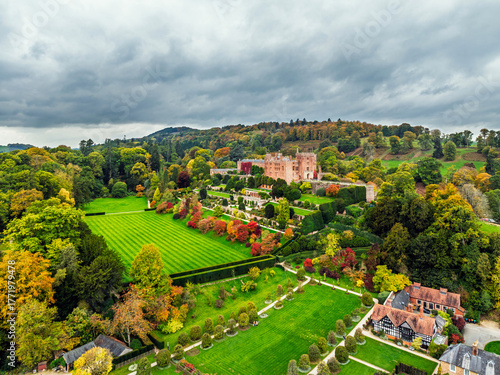 Autumn colours over Powis Castle and Garden from drone, Welshpool, Powys, Wales, England