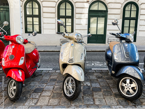 Vintage scooters parked on the street in Vienna, Austria