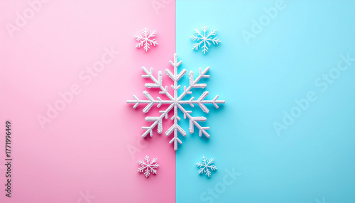 White snowflake on pastel pink blue background