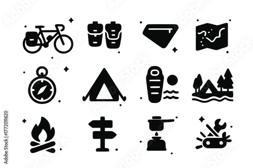 Bike Touring Icons. Scenic bike touring by the sea. Solid icons set of Scenic bike touring by the sea: touring bike, pannier bags, frame bag, map, compass,