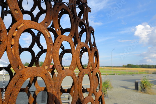 Horse shoe building or statue. Sign for plenty of luck concept.