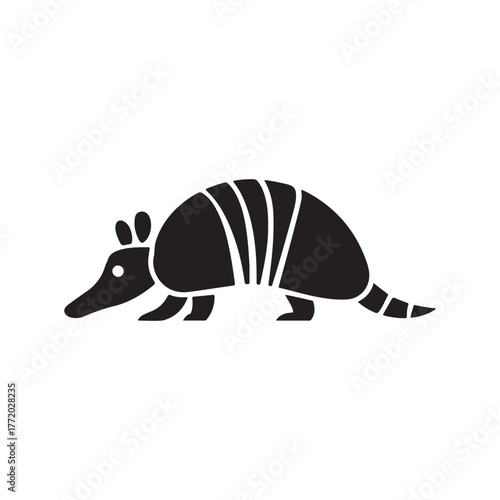 Armadillo silhouette illustration on white background. Simple wildlife animal design perfect for logo, tattoo, nature theme, or educational graphic art concept.