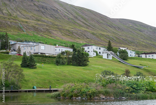 Town of Olafsfjordur in north Iceland on a summer day