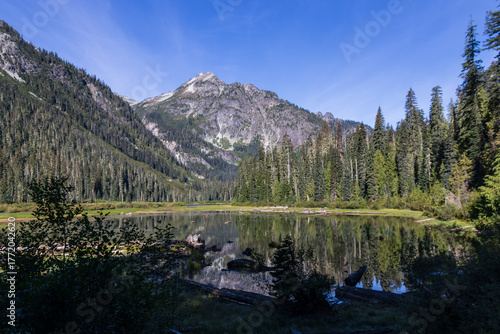 lake with trees and mountains in Washington State