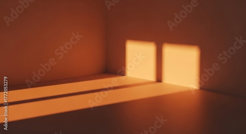 A tranquil and minimalist empty room corner where the golden hour sun casts long, geometric shadows, whisking a serene warmth across the walls and floor