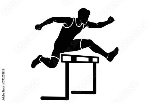 Silhouette of Male Hurdler Jumping Over Hurdle.