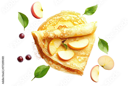 Stacked crepes with apple slices, cranberries, & green leaves