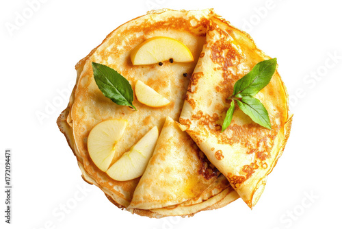 Stack of pancakes topped with apple slices and basil leaves