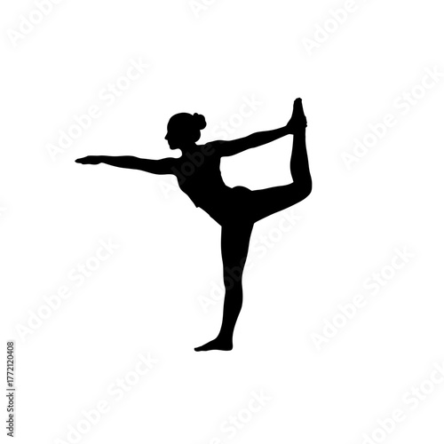 Balanced Silhouette of a Woman Performing the Natarajasana Dancer Pose Yoga Stretch