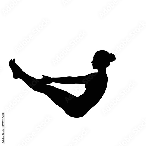 Strong Silhouette of a Woman Performing the Navasana Boat Pose Yoga Core Exercise