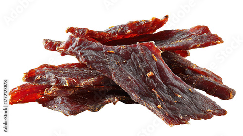 Several thin strips of dried, seasoned beef jerky sprinkled with spices, isolated on a white background