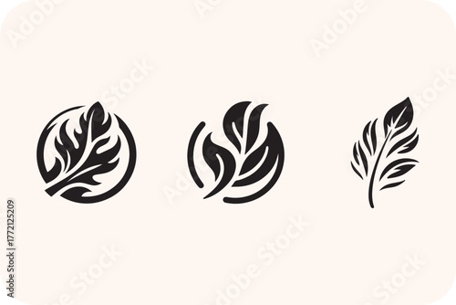 Set of three stylized black leaf icons on a light background