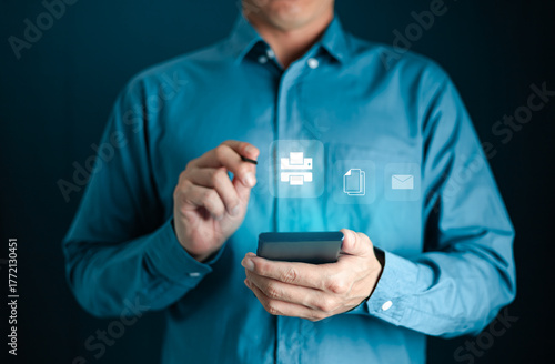Businessman use smartphone to printing the job. Print on cloud concept.Mobile printing concept