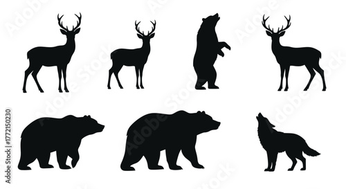 Silhouettes of majestic deer bears and a howling wolf in nature