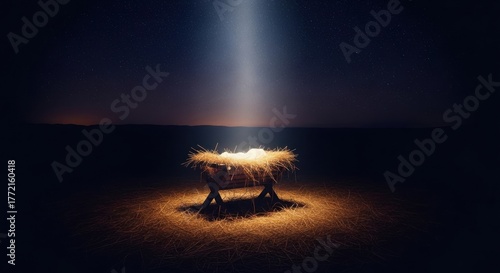 Empty manger with straw on the ground, illuminated by a divine light beam from the starry night sky