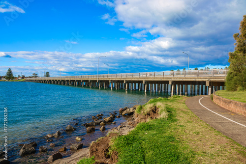 Wallpaper Mural  A serene coastal lagoon between Wollongong and Shellharbour, perfect for kayaking, fishing, birdwatching, and sunset walks — where nature, sky, and sea meet in harmony. Torontodigital.ca