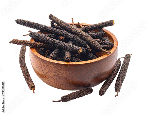 Dried Long Pepper Sticks in Wooden Bowl