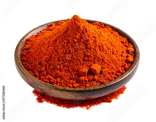 Ground Paprika Powder in Wooden Bowl
