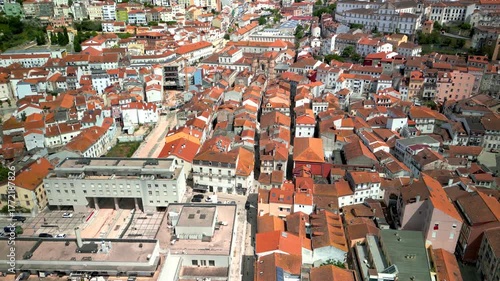 Aerial view of the city of Coimbra with many colorful homes , The fourth-largest agglomerated urban area in Portugal.