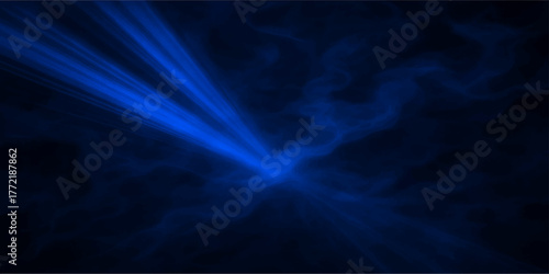 Abstract blue background of night sky with stars, light, and motion in dark space