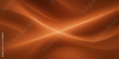 Softly flowing golden silk fabric with an abstract wave pattern creates a luxurious satin backdrop