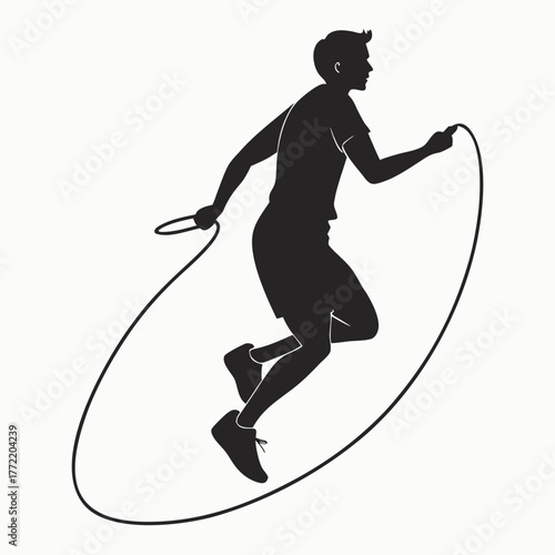 Silhouette of a fit man energetically jumping rope as part of his cardio workout routine for a healthy lifestyle