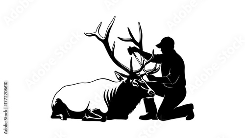 Hunter kneeling beside elk with transparent background
