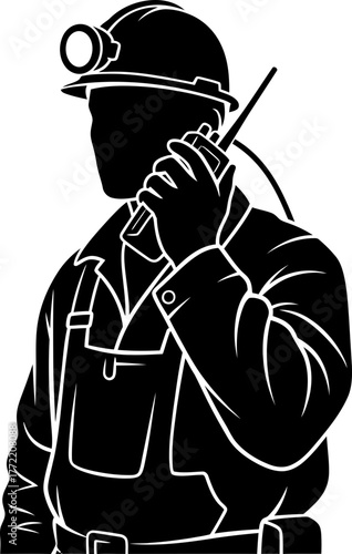 industrial link focused worker transmits crucial updates, coordinating vital operations from below