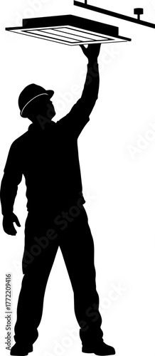 illuminating spaces worker installs essential overhead fixture, sparking bright new possibilities