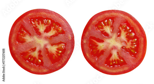 Two close-up tomato slices, vibrant red © Rizki