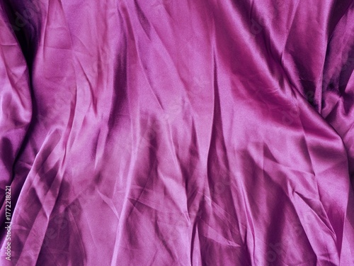 Wallpaper Mural Wrinkled and shiny purple satin fabric background. Ideal for luxury, fashion, and elegant abstract design backdrops. Torontodigital.ca