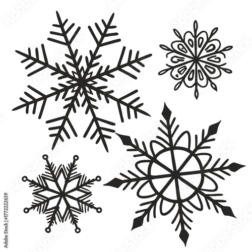 A collection of four distinct black snowflake illustrations with intricate geometric patterns and sharp crystalline arms set against a clean white background symbolizing winter and the holiday season