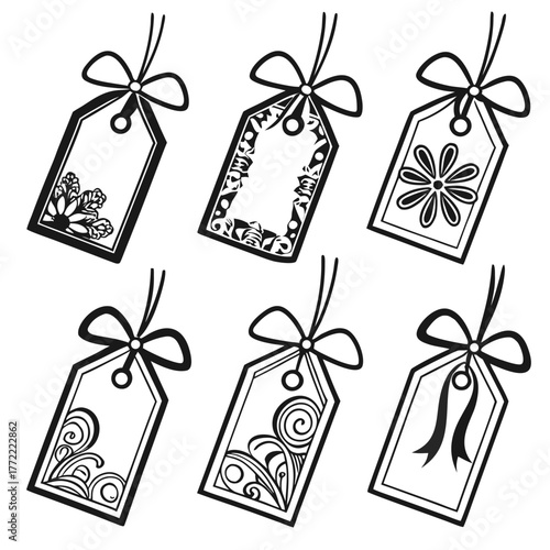 Collection of six decorative black and white gift tags with bows and intricate ornamental designs including floral patterns and swirling motifs