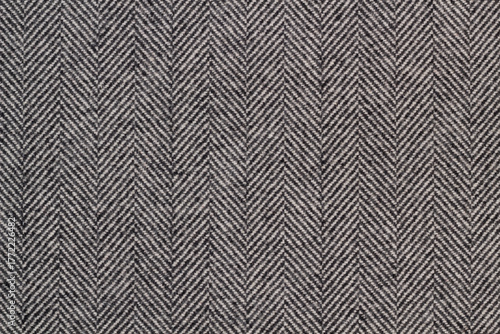 Cloth coats melange. The texture of the coat fabric close-up.