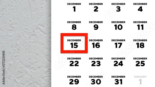 Close-up of the date December 15th marked with a red cursor on the wall calendar 2025