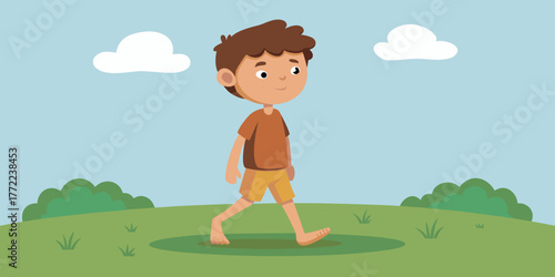 Young boy walking barefoot on green grass in a sunny field  