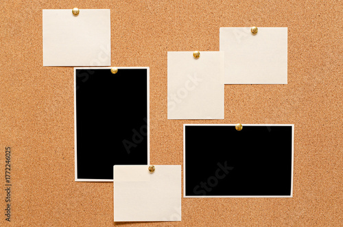 Blank paper notes and an empty photo are pinned to a cork board. The concept of detective investigation or a webinar.