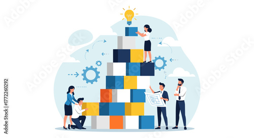 A team of business professionals collaborate to build a tower of blocks, symbolizing teamwork, problem-solving, and the creation of innovative ideas and solutions.