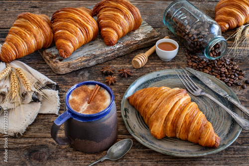Fresh French croissants in the plate. 