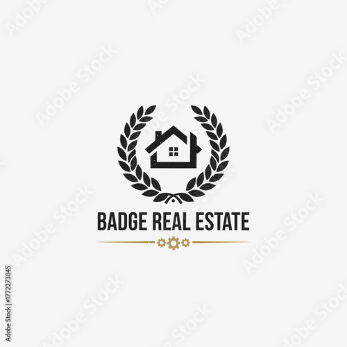 A real estate themed logo with a house inside a wreath and text on a neutral background