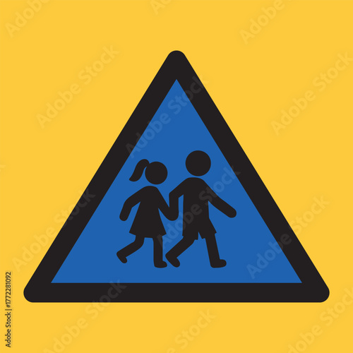School crossing sign with silhouettes of children walking together safely