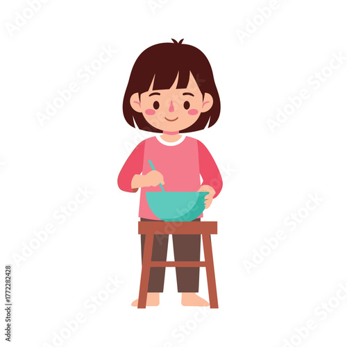 A young girl, standing on a stool, mixes ingredients in a bowl.