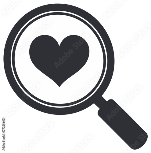 Searching for love concept with heart symbol inside a magnifying glass to express love and affection.