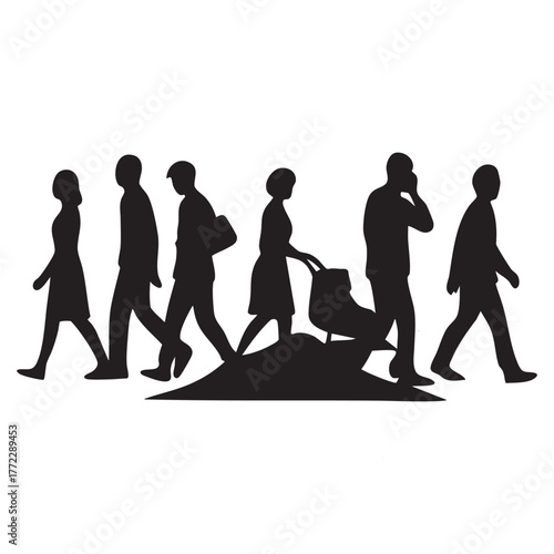 Silhouettes of people walking on a busy city street at dusk