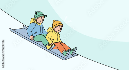 Kids sliding down a snowy hill on a sled