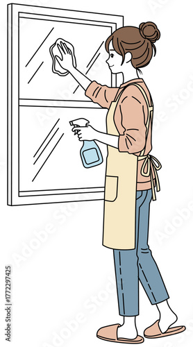 窓ふきをする女性01